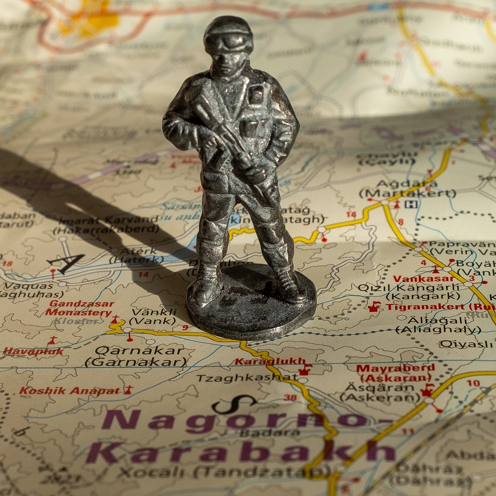 Metallic soldier located on a map over the Nagorno Karabakh